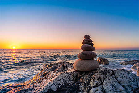 Zen stacked stones at the beach